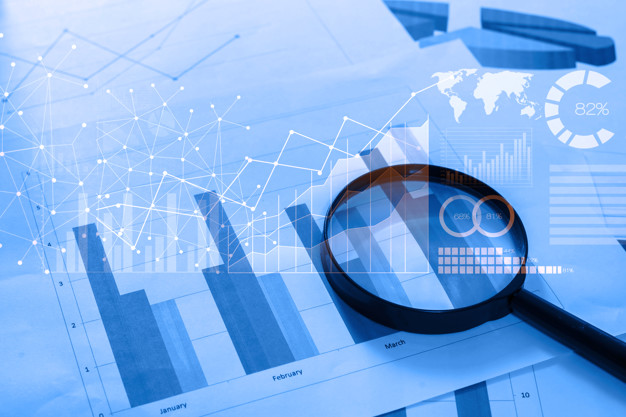 قواعد الاستثمار الأربعين في أفضل شركة دراسات جدوى في عمان magnifying glass and documents with analytics data lying on table 33799 219 - قواعد الاستثمار الأربعين في أفضل شركة دراسات جدوى في عمان