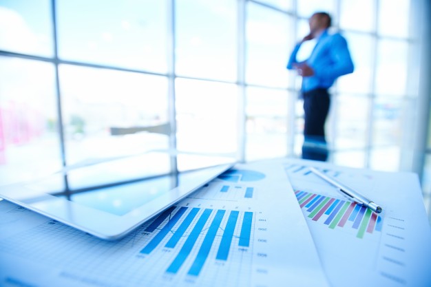أفضل شركة دراسة الجدوى في السعودية statistic documents with businessman blurred background 1098 293 - أفضل شركة دراسة الجدوى في السعودية